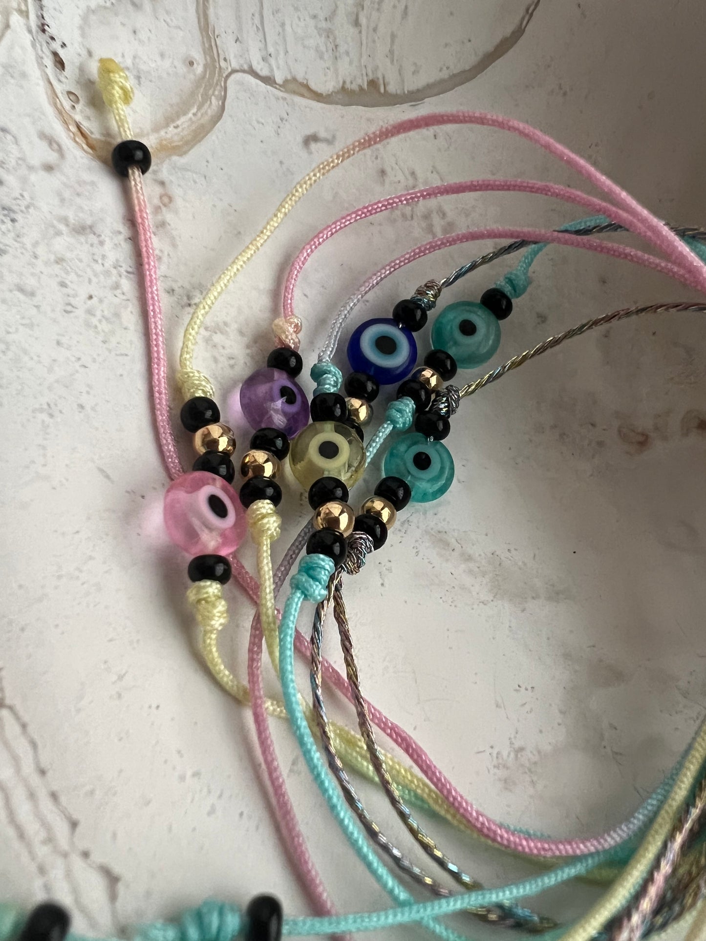 Pastel shades evil eye friendship bracelets