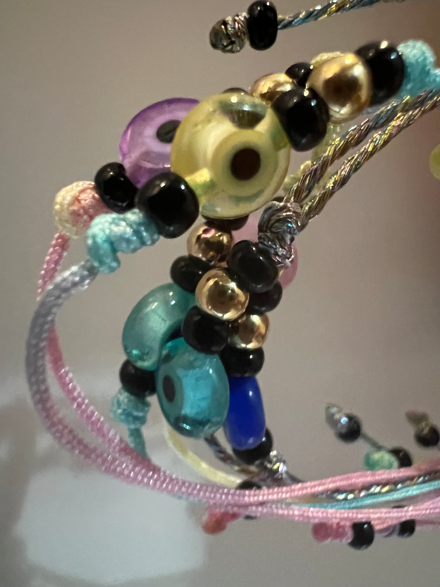 Pastel shades evil eye friendship bracelets