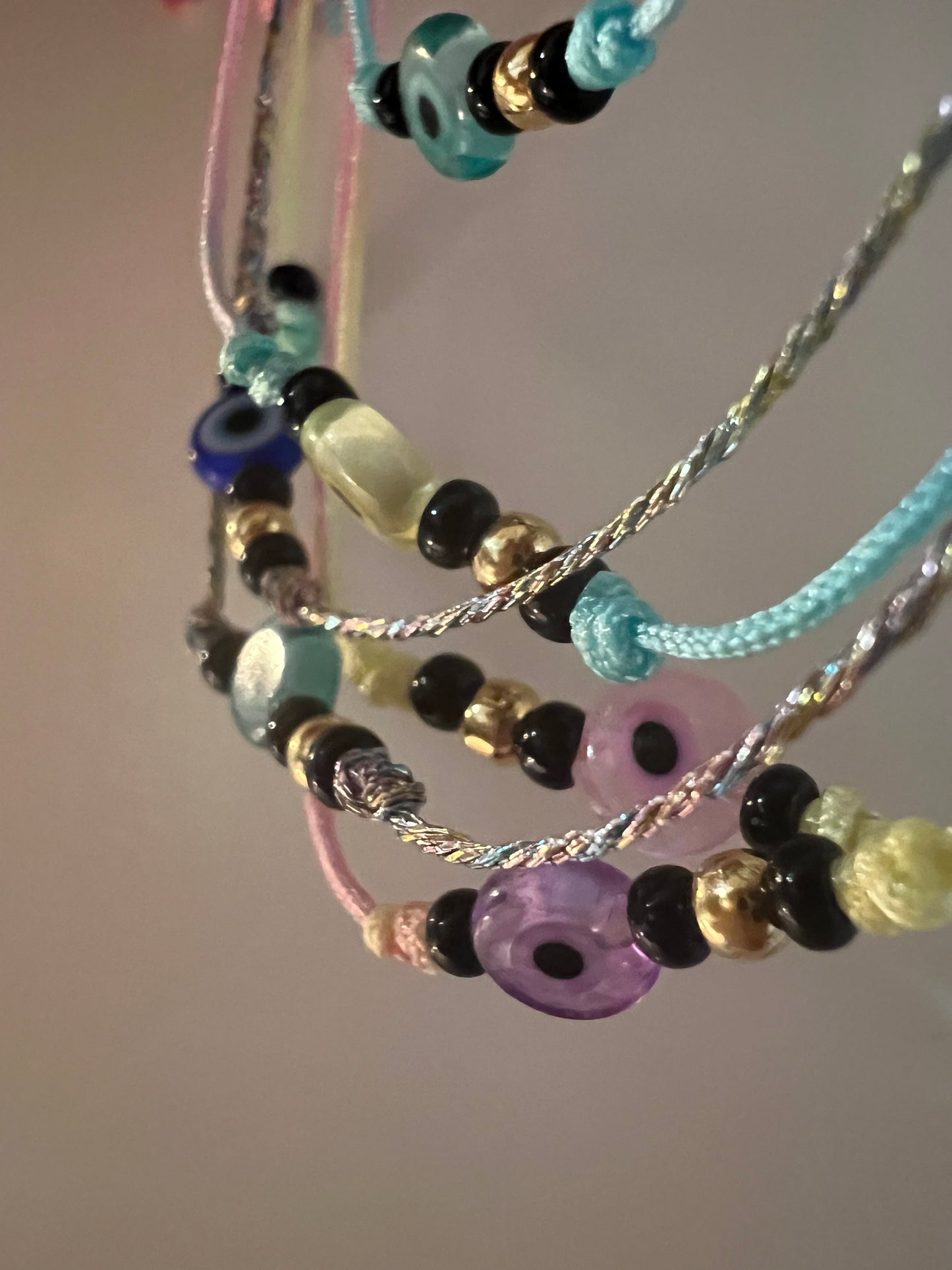Pastel shades evil eye friendship bracelets